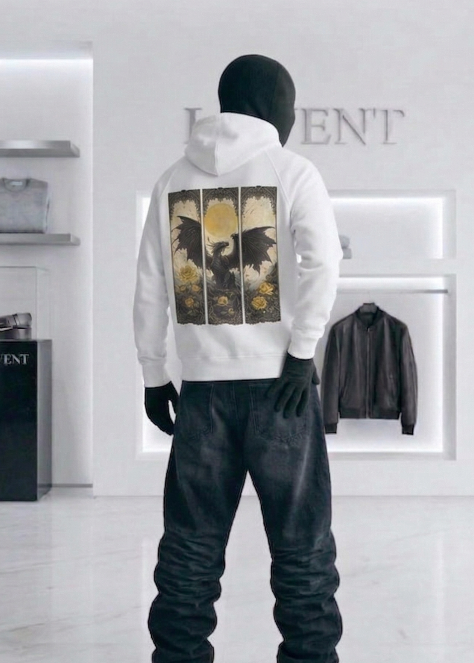 Person wearing a white hoodie with graphic design in a modern interior setting